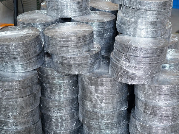 Woven mesh packaged with plastic