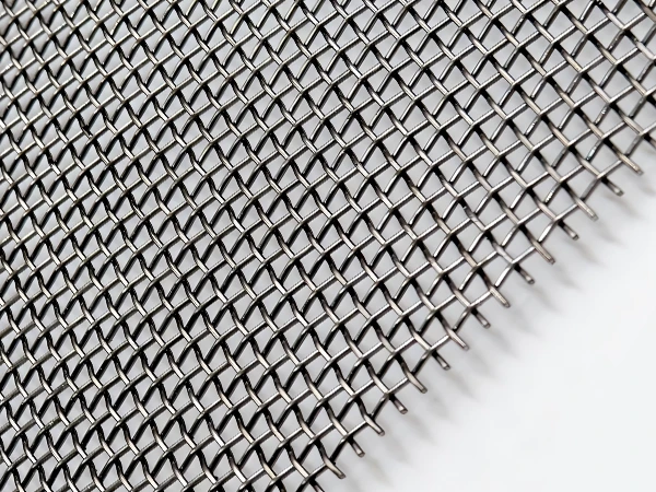 A piece of stainless steel square weave mesh