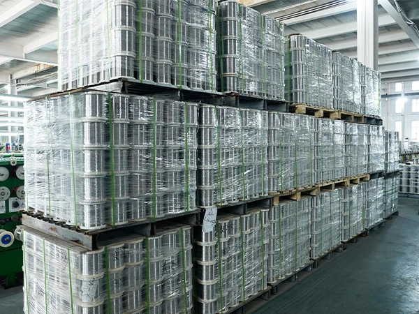 Some stainiless steel wire raw materials are stacked together.